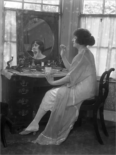 Actress, Miss Marjorie Hume at her toilette. 1920s