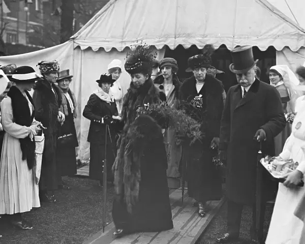 Queen Alexandra at nurses bazaar and fete at Devonshire house 1 May 1919