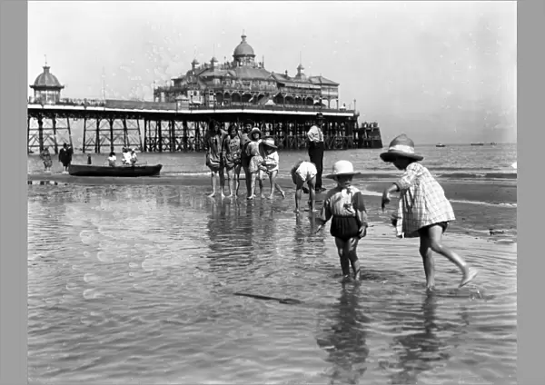 Young children having holiday fun in the sea at Eastbourne. 9 August 1916