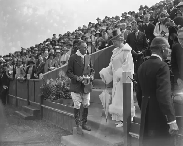 Polo at The Hurlingham Club, London - The Queen Queen presents the cup to Lord