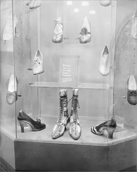 Boots worn by Queen Alexandra at a fancy dress ball, on show at a fair. 8 October