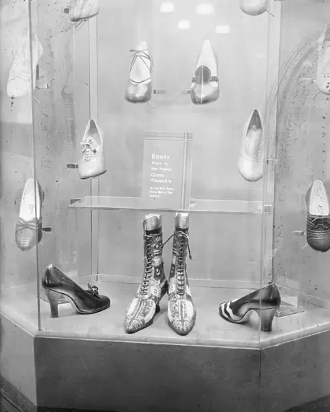 Boots worn by Queen Alexandra at a fancy dress ball, on show at a fair. 8 October