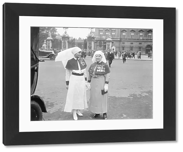 King holds investiture at Buckingham Palace. Matron in Chief Florence Hodgins