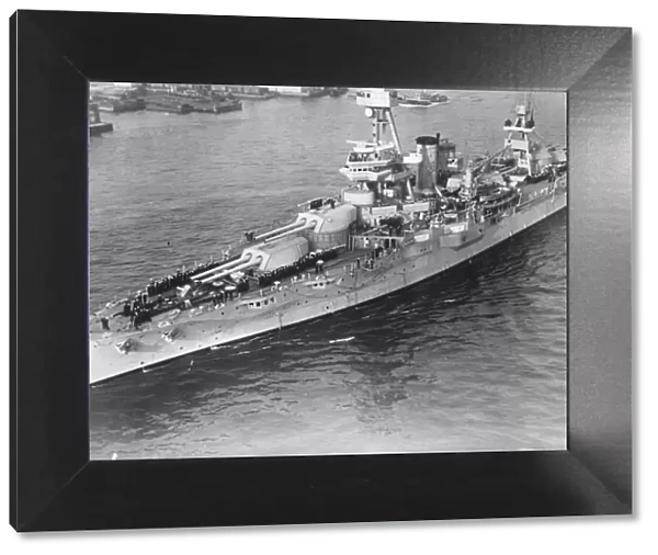 Naval majesty. A fine study of the US battleship Texas passing under Manhatten Bridge, New York