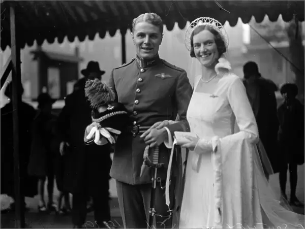 Famous flying officer weds. H F G Southey and Miss Joan Davies at St Pauls Knightsbridge