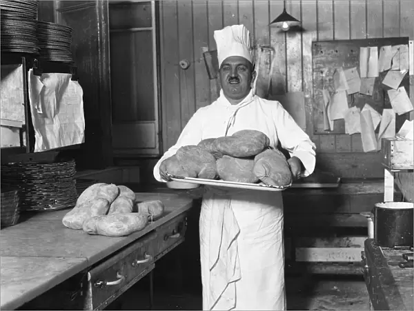 M Latry, the famous chef at the Savoy Hotel, with haggis in readiness for the