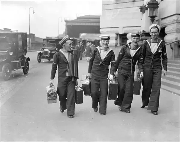 Sailors arriving at Waterloo on leave, complete with attache cases. 2 August 1929