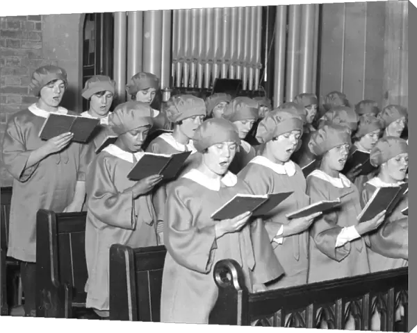 Girl choristers at Dr Barnardos homes, Berkingside, practising christmas carols
