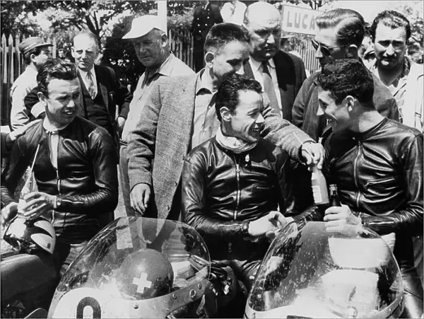 The 1st, 2nd and 3rd seen in the paddock after winning the 125 cc TT race on the Isle of Man