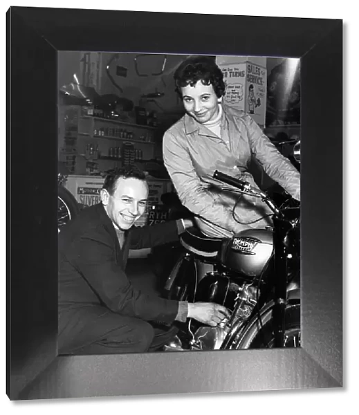 John and Dorothy Surtees in their family motorcycle shop 1950s
