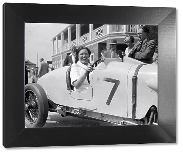 Mrs R H Beeles wife of Mr Eccles Special seen here driving her husbands car in the second race