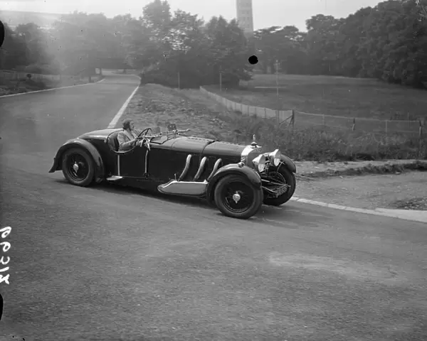 Mrs Roy ( Marjorie ) Eccles making her circuit of the race track. The first woman