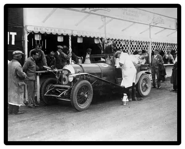 Le Mans 1927 Old Number 7 3 litre Bentley at the pits being refilled by Dr J D Benjafield