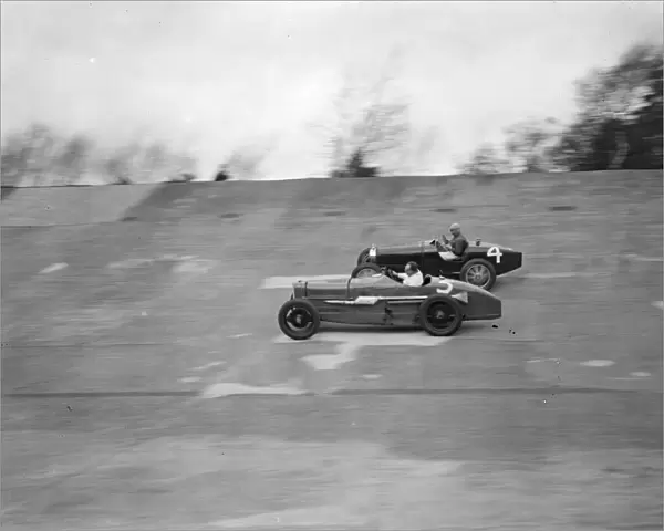 A close race at Brooklands. Crowds thronged the Brooklands track for the great