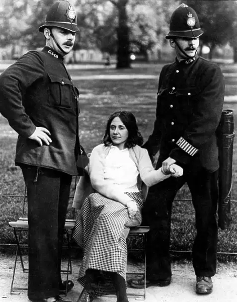 Votes for Women - policeman with a suffragette arrested in Hyde Park about 1912