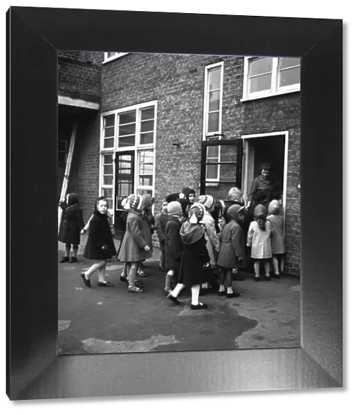 Children arriving at Jessop Primary School, Herne Hill, SE London 12th January 1961
