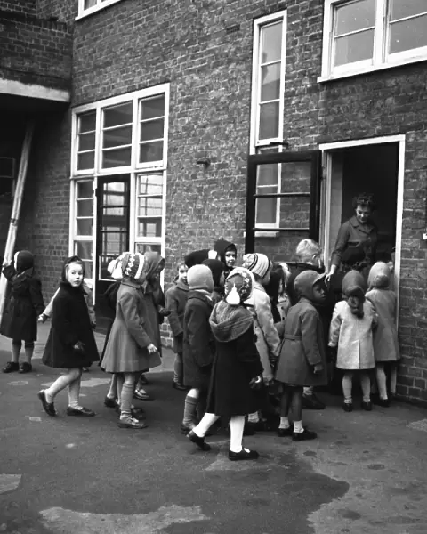 Children arriving at Jessop Primary School, Herne Hill, SE London 12th January 1961