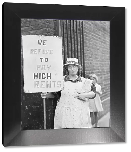Wives as pickets in East End no rent strike. What is stated to be the largest