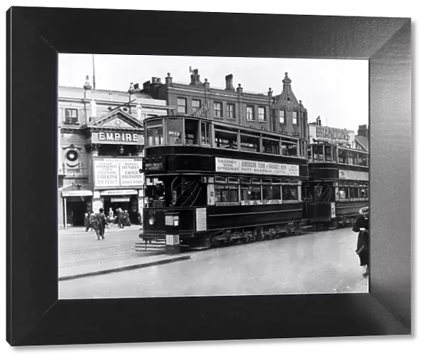 Trams outside the Islington Empire London 1 June 1936