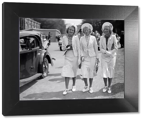The Mawby Triplets, Claudette, Angela and Claudine, attending Goodwood, West Sussex