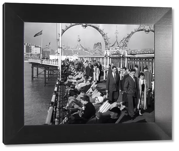Brighton Pier Crowds enjoying a spring like day after a long winter 1st March 1959