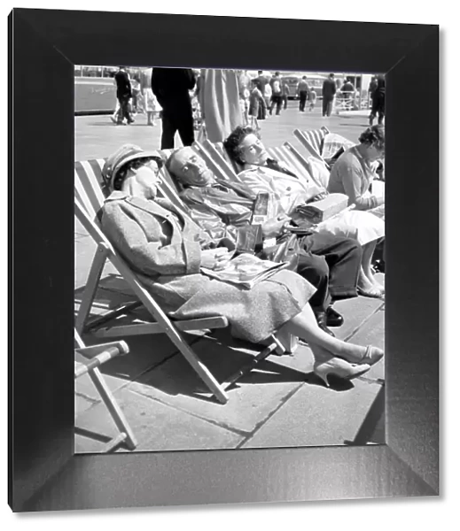 Brighton Elderly people asleep in deckchairs on the front at Brighton 6 August 1961