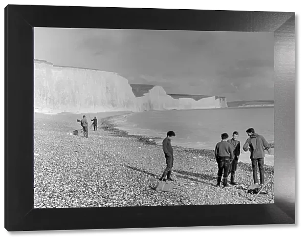 Boys sea fishing at Seven Sisters, Birling Gap, Sussex, England. 1960 s