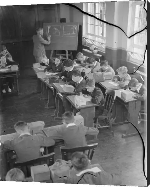 Children at school in Sidcup, Kent, during wartime. Here they are in a drawing