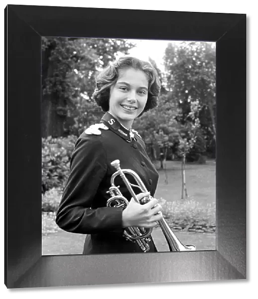 Carole Reinhart a 20 year old music student plays in a Salvation Army Band in Miami, Florida