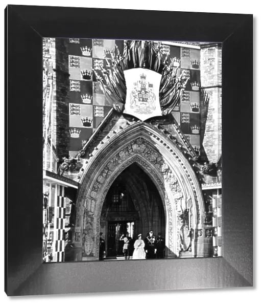 H. M. Queen Elizabeth II and Prince Philip standing under the arch of the Peace Tower