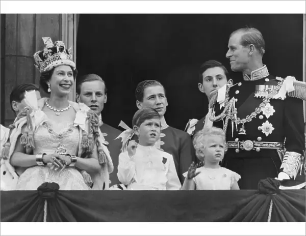 Queen Elizabeth II gestures as her husband Duke of Edinburgh Prince Phillip and children