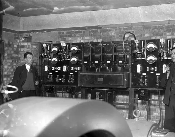 Switch Board at Commodore Cinema, Orpington, Kent in the 1930s, with cinema staff looking