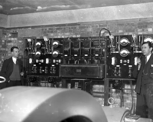Switch Board at Commodore Cinema, Orpington, Kent in the 1930s, with cinema staff looking