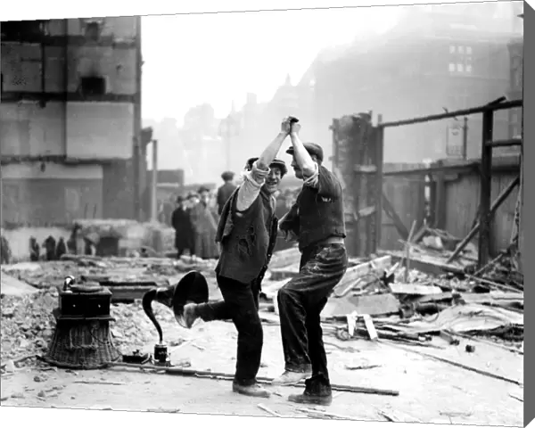 Workmen dance to the newfangled gramophone - 1923 dance  /  dancing  /  party season