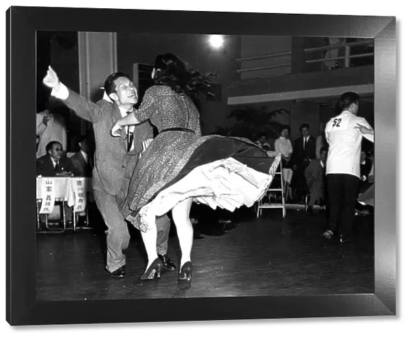 Couple energetically Dancing jive or jitterbug 1950s dance  /  dancing  /  party