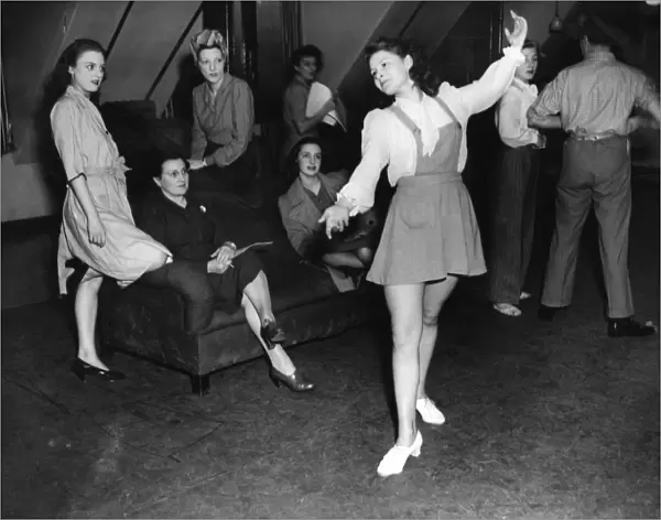 Windmill girls in 1946 dance  /  dancing  /  party season  /  celebration  /  happy vintage
