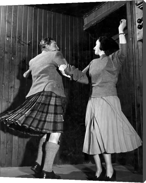 Scottish Country Dancing. Ian Gillies and partner demonstrate the interlocking swing