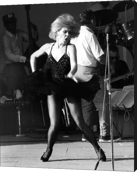 Joey Heatherton, entertains American servicemen with a torrid dance during the troops