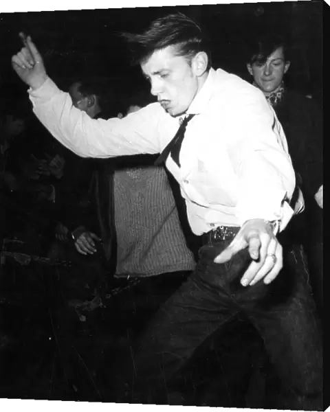 Dancing to rock n roll 1950s dance  /  dancing  /  party season  /  celebration  /  happy