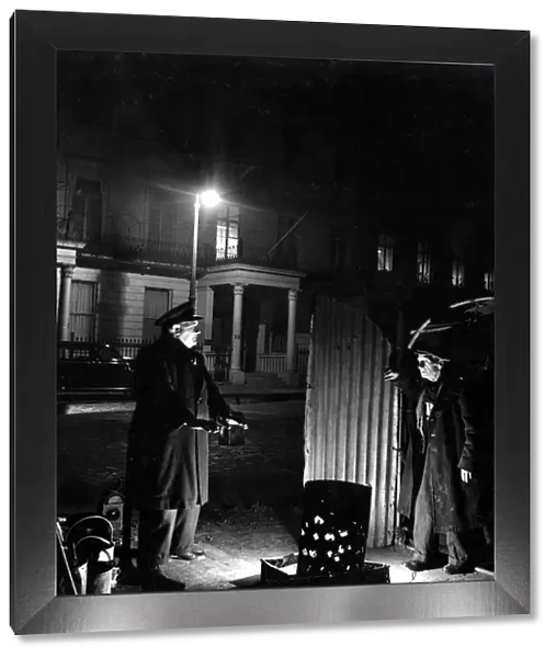 29 March 1952 Bill Howard a Romany night watchman in Belgrave Square, talking to