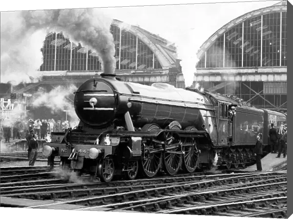 The Flying Scotsman pulls out of Londons Kings Cross station to make the last
