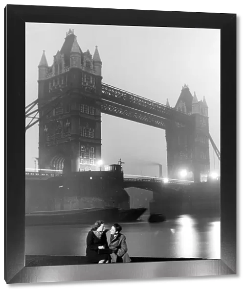 Courting couple 40s  /  50s with Tower Bridge in background love couple romance romantic