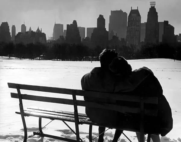 Couple enjoying the snow in Central Park New York 1962 love couple romance romantic