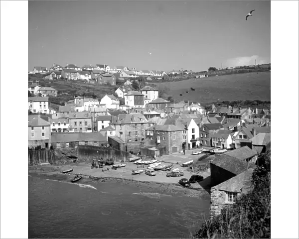 Harbour with boats at Port Isaacs, Cornwall, England, UK 1960s Fish where the fish are