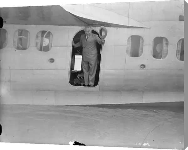 Australian Premier, leaves for Holland by flying boat on way home. Mr J A Lyon s