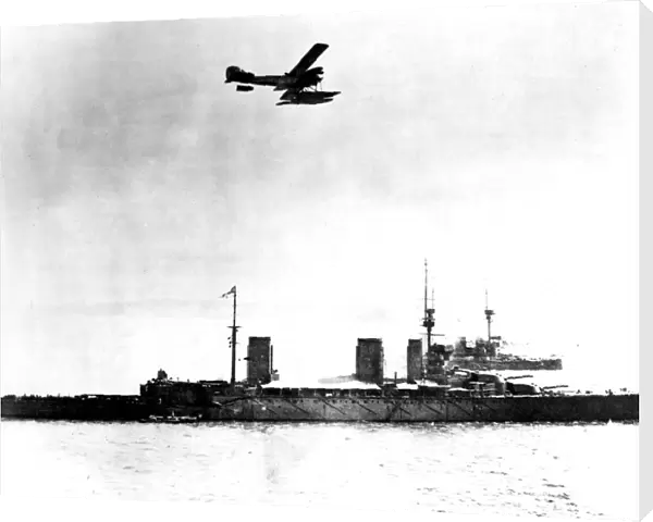 British seaplane circling British warships circa 1916