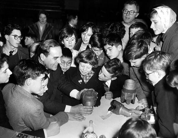 29th December 1960 Dr T. F. Gaskell of the British Petroleum Company, showing schoolchildren