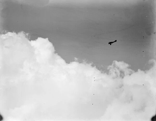 Aerial Derby at Hendon on July 5th Plane silhouetted in the clouds 21 June 1919