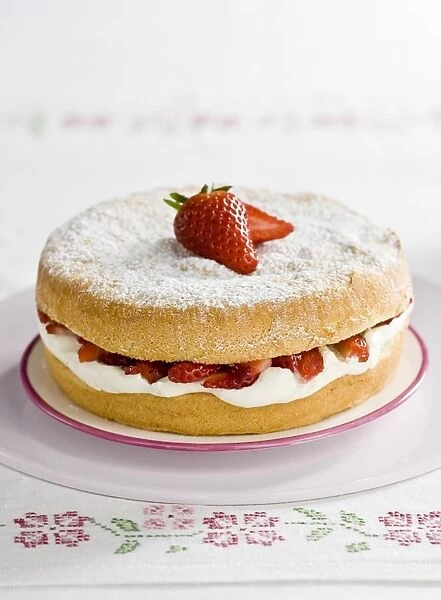 American sponge cake with whipped cream and strawberries credit: Marie-Louise Avery