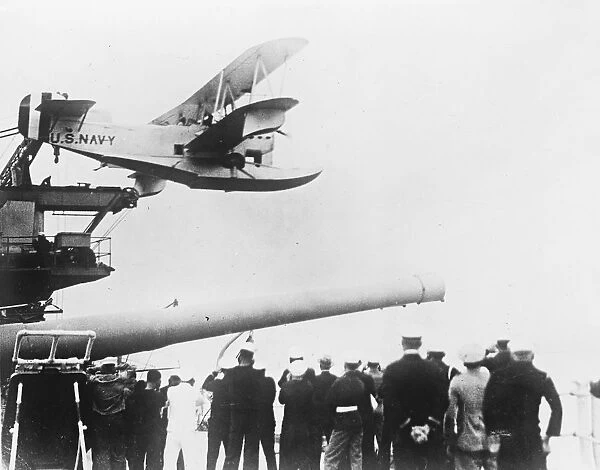 Amphibian plane fired from turret of a battleship for the first time. The first